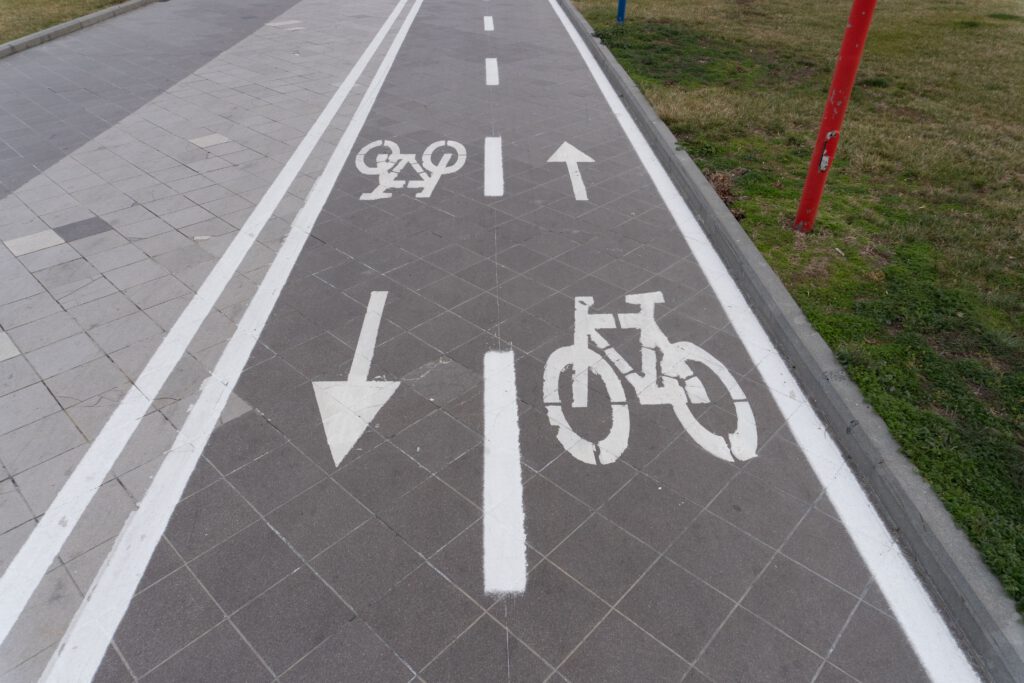 commercial-plumbing Upward view of bike lane markings in Baku, Azerbaijan. Clear directional arrows guide cyclists.